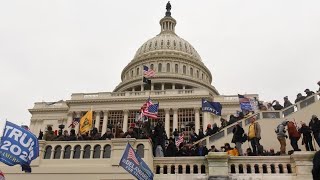 Stocks rise despite chaos in Capitol
