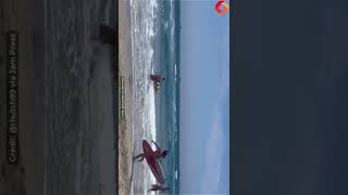 Shocking moment plane crashes into ocean – metres away from lifeguard competition