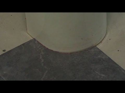 Cutting the curve - How to install tile around a toilet Cutting the curve - How to install tile around a toilet