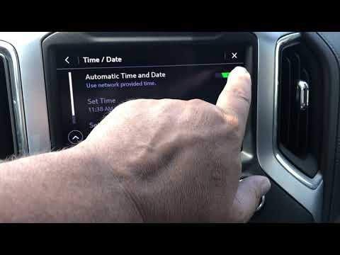 How do you set the clock on a 2020 GMC Sierra?