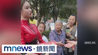 真假難辨！中國「美女機器人」發傳單　竟是真人假扮｜#鏡新聞