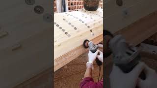 Perfecting the Surface: Sanding the First Layer of a Clinker-Built Whitehall Dinghy.