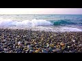 糸魚川ユネスコ世界ジオパーク　ラベンダービーチに流される石ころたち itoigawa unesco global geopark stones along lavender beach