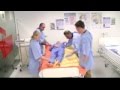 Patient to prone using two SlipperySally® slide sheets & four carers