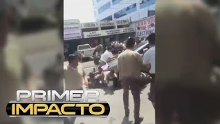 Conductor enfurecido embiste a un grupo de estudiantes que protestaban en una calle de Guatemala