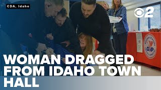 Investigation opened after woman was dragged from an Idaho town hall