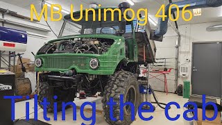 Mercedes Benz Unimog tilting the cabin fwd. for access.