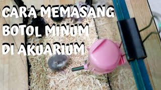 Cara memasang botol minum di Akuarium Untuk Hamaster