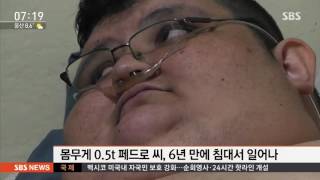 누워만 있던 500kg 남성…6년 만에 일어났다 / SBS