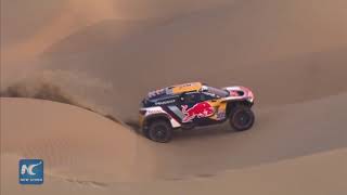 Dakar Rally drivers roll into treacherous sand dunes in Bolivia