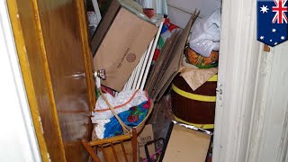 Trapped hoarder rescued from HUGE junk pile - TomoNews