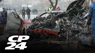 Vigil for victims held near site of helicopter crash in Kyiv