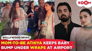 Mom-to-be Athiya Shetty seen HIDING her baby bump as spotted at Mumbai Airport