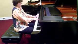 Sandrine Erdely-Sayo plays the Cunningham Concert grand for the first time