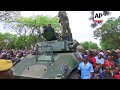 Zimbabwe - Mugabe makes first public appearance amid pressure to exit / Thousands attend anti-Mugabe