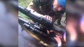 'DPR' fighter teaches pre-teen boy how to shoot carbine