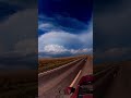 Driving up on a explosive supercell north of Ft. Sumner, NM.