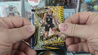 2023-24 Panini Revolution Basketball Holiday Tin Break - Are these a buy or pass?