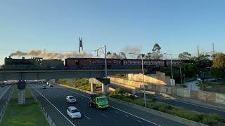 Steam train crossing Eastlink in Ringwood, Victoria, Australia