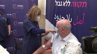 Israel tests second booster shot on health workers