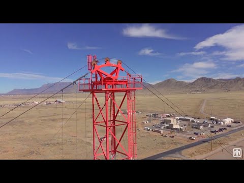 Why are nuclear fuel rods transported by train?