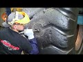 Quick replacement of car tires with machinery, giant tractor tire repair repair patch