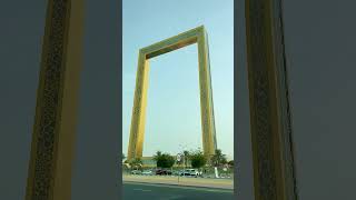 Dubai Frame  incredibly stunning stands out more as  sunray hits  gold plating of humongous frame.