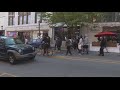 People march through Downtown Greensboro after guilty verdict in Derek Chauvin case