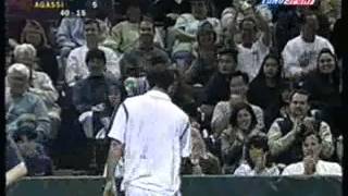 Pete Sampras plays with broken strings against Andre Agassi