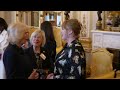 queen consort camilla hosts star studded reception for international women s day