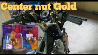 Install gold center nut and inner tube bolts [ RAIDER 150 ]