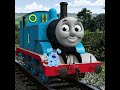 Thomas the Tank Engine showing Baby Blue a toy of himself