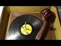 airline 78 rpm record player in operation