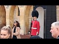 Tourist jumps when she see the kings  guards gun up  close  #windsorcastle