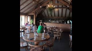 An oak framed restaurant in  St Merryn, Cornwall by Post and Beam Ltd.