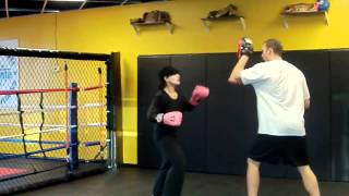 Elisa getting a workout with Richard Hale at Koncrete Gym