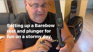 Setting up a Barebow rest and plunger on a stormy day. By Joe Zummo