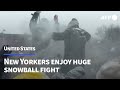 'A little bit of levity': massive snowball fight breaks out in storm-hit New York | AFP