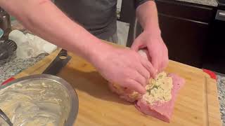 Making hot and cheesy pork roll