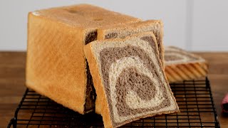 Toast bread - marbled wheat-rye bread. Delicious toast bread. Bread in the oven. Bread toast