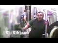 Shocking moment man attacks commuter with a machete on the tube