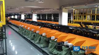 Tilttray sorter for postal distribution center and B2C warehouse hub