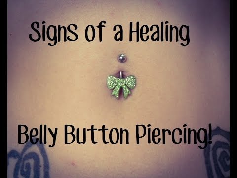 Signs of a Healing Belly Button Piercing. Signs of a Healing Belly Button Piercing.
