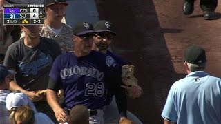 COL@SD: Arenado shaken up after diving into stands