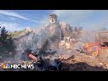 Video shows fire burning huge Buddha statue in China