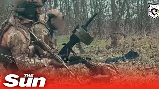 Belarusian volunteer forces fire multiple grenade launchers at Russian targets