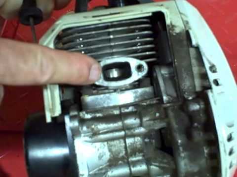 Small Engine Repair: Cleaning Carbon Buildup on the Exhaust Port & Muffler on a 2 Stroke Engine Small Engine Repair: Cleaning Carbon Buildup on the Exhaust Port & Muffler on a 2 Stroke Engine