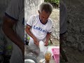 grandpa making iced lemon tea in the traditional way