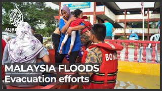 Eight killed in Malaysia floods amid criticism of rescue efforts