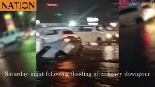 Cars submerged on Namanga Road, Kitengela, on Saturday night following flooding after heavy downpour